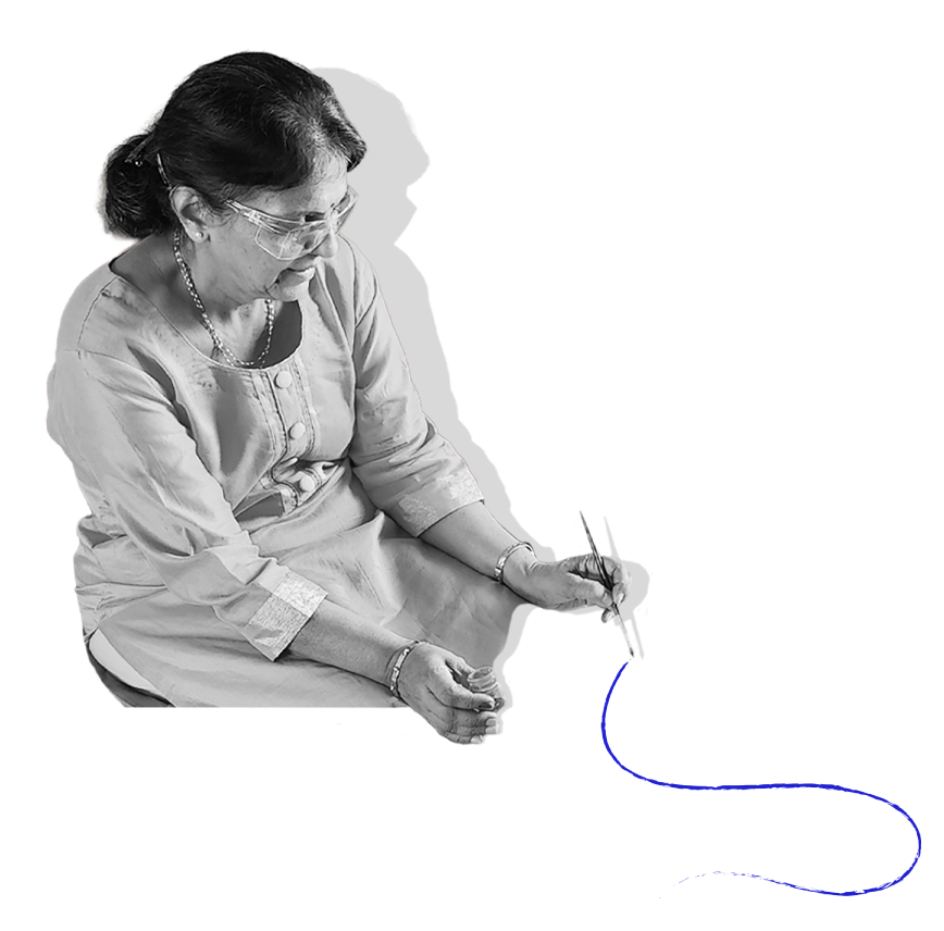 Elderly woman painting clay